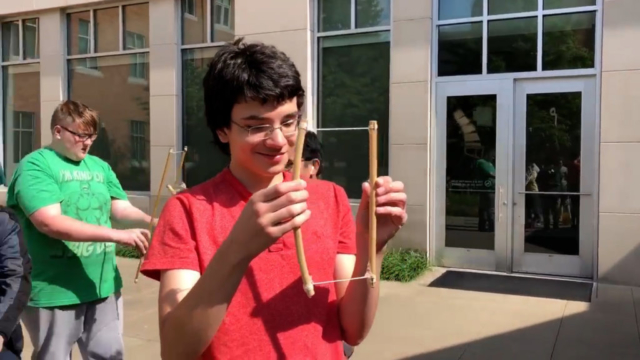 Teens take a break from schoolwork to enjoy some bubbles on the patio at EVPL Central.