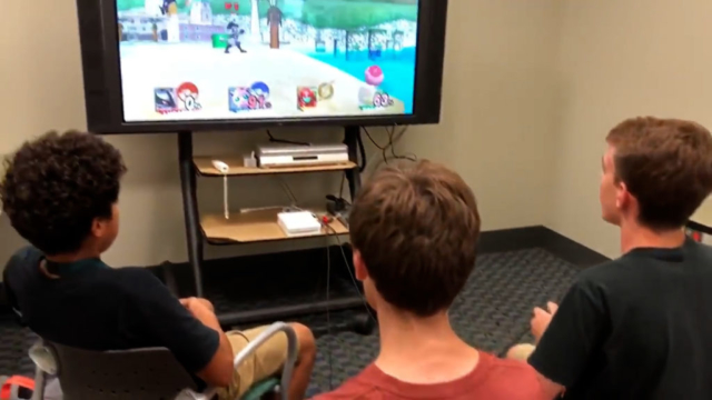 Library users enjoy Teen Gaming at EVPL Central.